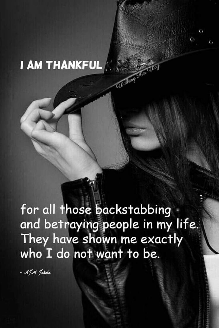 a woman wearing a cowboy hat and holding her hand up to her face with the caption, i am grateful for all those backstabbing and being people in my life they have shown