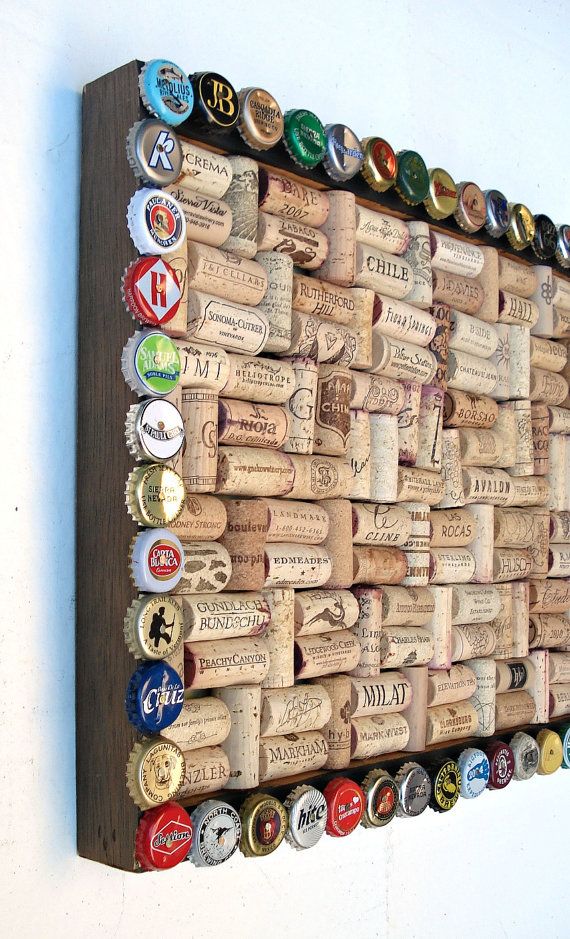 a wine bottle cork board mounted to the wall