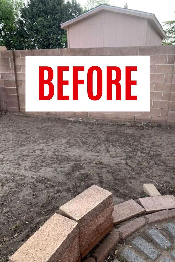 a sign that says before in front of a brick wall and grass area with bricks on the ground