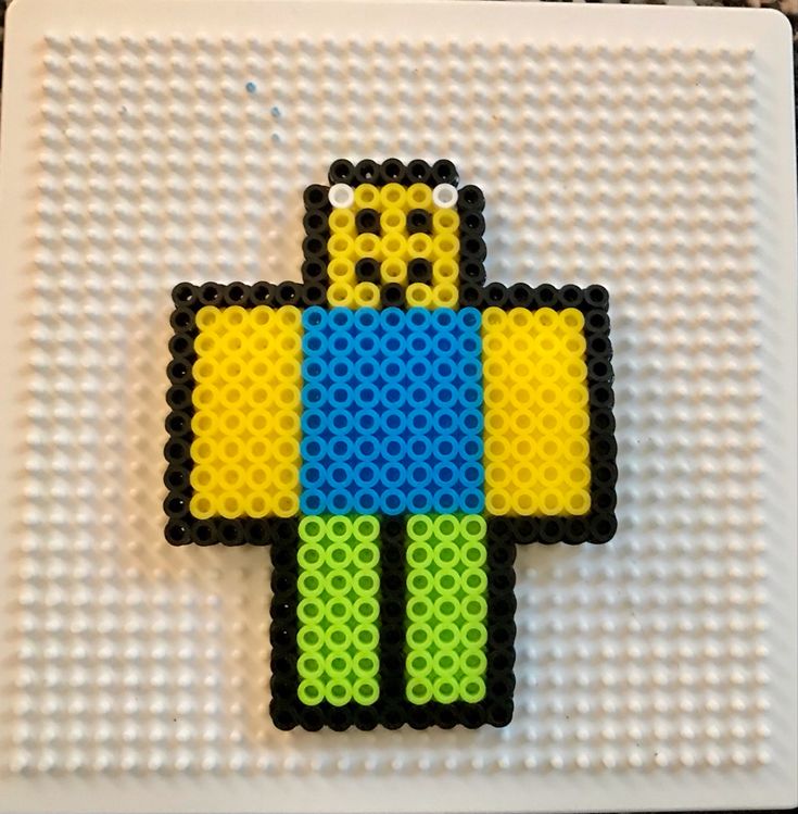 Roblox noob perler beads Perler Beads Roblox Patterns, Kandi Patterns Perler Beads, Aesthetic Melty Beads, Roblox Perler Bead Patterns, Roblox Perler Beads, Iron Beads Ideas Aesthetic, Tyler The Creator Perler Beads, Funny Perler Beads, Roblox Crafts