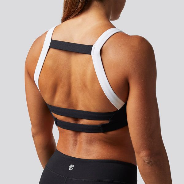 Sporty Sports Bra With Strappy Back And Built-in Padding, Black Cross Back Activewear With Built-in Padding, Supportive Fitted Sports Bra With Built-in Padding, Black Compression Activewear With Built-in Padding, Fitted Nylon T-back Activewear, Supportive Black Activewear With Built-in Padding, Sporty Fitted T-back Sports Bra, High Stretch Sports Bra With Built-in Padding For Training, Fitted Running Activewear With Built-in Padding