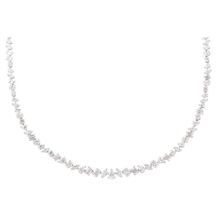 A unique diamond necklace. 12.01 carats of oval, pear, emerald, marquise and round cut white diamonds set in 18k white gold. 16 inch length This necklace can be dressed up or down, perfect for a black tie event or fabulous with a t shirt! We have a large collection of multi-shape pieces in all sizes, please contact us for more information. Silver Diamond Necklace With Marquise Single Cut Diamonds, Marquise Cut White Gold Diamond Necklace For Formal Occasions, Silver Marquise Cut Diamond Necklace For Formal Occasions, White Marquise Cut Diamond Necklace For Formal Occasions, Elegant Silver Marquise Cut Diamond Necklace, White Marquise Cut Diamond Necklace For Formal Events, White Diamond Cut Necklace For Party, White Marquise Cut Diamond Necklaces, White Marquise Cut Diamond Accent Necklace