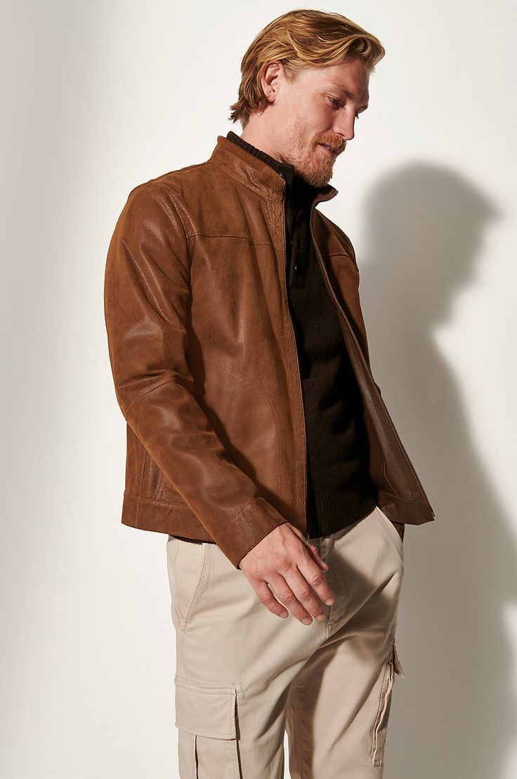 No matter which side you wear the Lawrence reversible leather jacket, you'll appreciate its handcrafted fit and inimitable texture – one that's soft-to-the-touch, goatskin suede, and the other that's smooth Nappa. No matter how you wear it, its stand-up collar and tailored fit give the Lawrence just enough attitude to make it stand out. Suede Leather Jacket For Business In Winter, Winter Suede Leather Jacket For Business, Business Suede Leather Jacket For Fall, Leather Jacket With Suede Lining For Fall, Fall Leather Jacket With Suede Lining, Winter Business Suede Leather Jacket, Winter Leather Jacket With Suede Lining, Leather Outerwear With Suede Lining For Work, Leather Jacket With Suede Lining