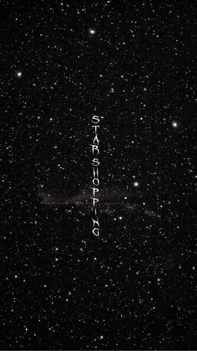 the words are written in white on a black background with stars and space around it