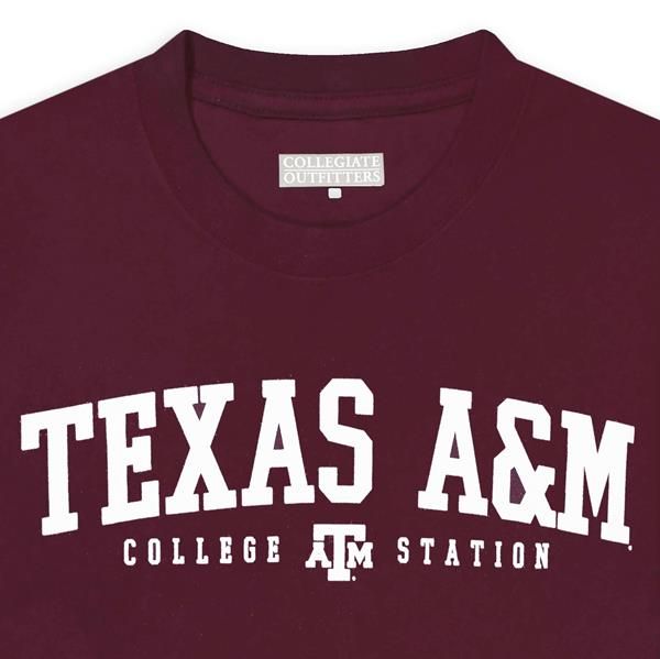 "Keep your little aggies looking fresh with this classic t-shirt design! The front of this maroon shirt features ""Texas A&M"" across the front in a big bold white font while the back displays a big block ATM!Brand: Collegiate Outfitters100% CottonMachine Wash Cold/ Tumble Dry " Fall Varsity T-shirt With Logo Print, Collegiate T-shirt With University Logo For Game Day, Fall Fan Apparel T-shirt With Logo Print, Crew Neck T-shirt With University Logo For Fall, Game Day University Logo Short Sleeve T-shirt, Collegiate Fan Merchandise T-shirt For Fall, Collegiate Fall Fan Merchandise T-shirt, Team Spirit University Logo T-shirt With Crew Neck, Team Spirit T-shirt With University Logo