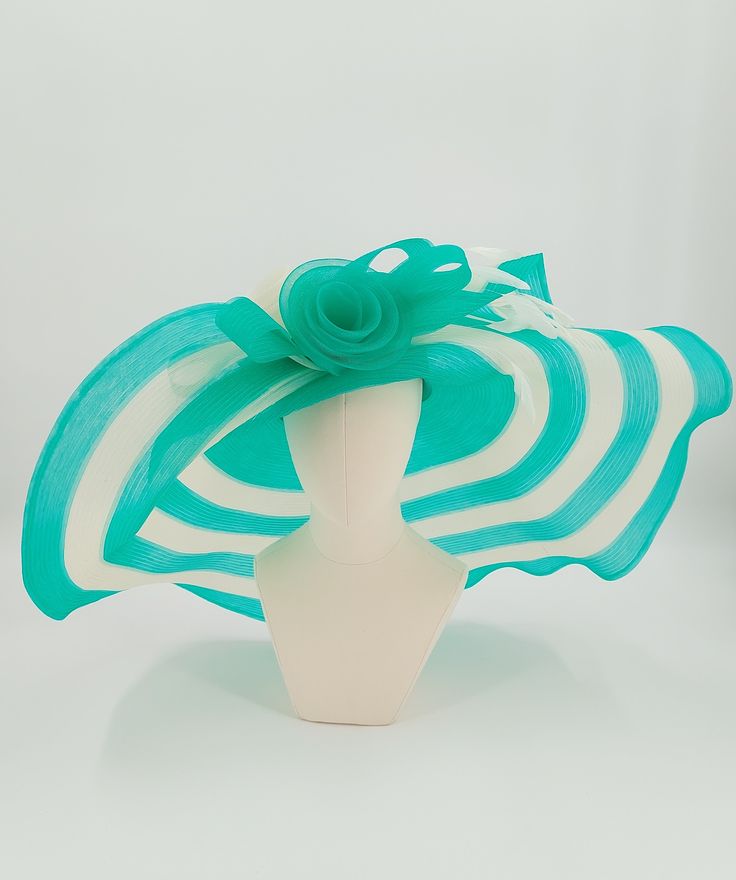 Breathtaking ladies hat perfect for the Kentucky derby. Chic Structured Crown Hat For Kentucky Derby, Chic Kentucky Derby Hat With Structured Crown, Chic High Crown Fascinator For Races, Kentucky Derby Structured Crown Hat For Races, Chic Hats With Structured Crown For Races, Elegant Green Wide Brim Sun Hat, Chic Top Hat With Curved Brim For Kentucky Derby, Chic Mini Hat With Structured Crown For Kentucky Derby, Chic Mini Hat For Races With Structured Crown