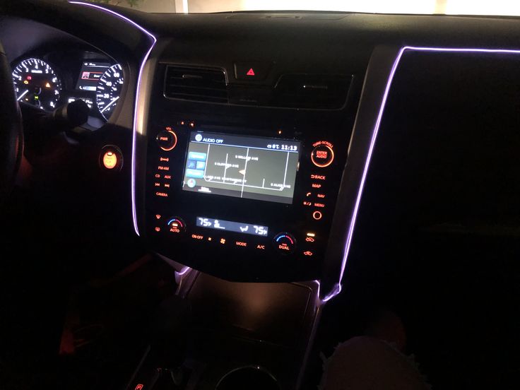 the interior of a car with an electronic display