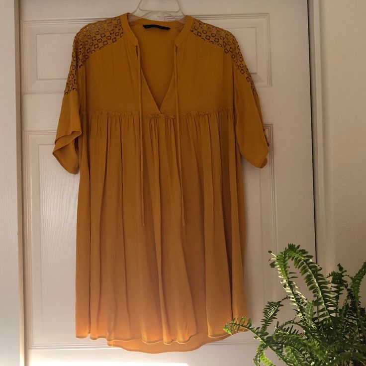 Zara Basic Sunflower Golden Yellow Babydoll Dress, Never Worn! With A Straight Neckline And Tie At The Top, There Are Box Cutouts Across The Shoulders With Accentuation At The Bust. Swingy!! Fits A Size M And Is Loose And Flowy And Comfortable. Extremely Minimalist, Cottagecore, Thrifty Comfy Beach Miami Chic. Tags: Free People Anthropologie Urban Outfitters Uo Reformation Madewell Boho Thrift Witch Cottagecore Hippie Goth Edgy Circle Swing Dress Gauze Dainty #Zara #Yellow #Summerdress Cute Yellow V-neck Mini Dress, Cute Yellow V-neck Dress, Yellow Tunic Summer Dress, Yellow Tunic Dress For Summer, Mustard Flowy V-neck Dress, Cute Yellow Dress For Day Out, Yellow Tunic Dress For Spring, Mustard V-neck Flowy Dress, Cute Yellow Dress For Brunch