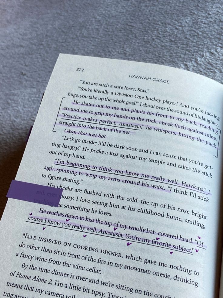 an open book with some type of writing on it's page and the text in purple