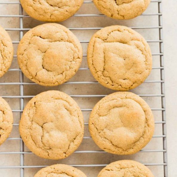 freshly baked cookies on a cooling rack ready to be eaten for breakfast or desserts