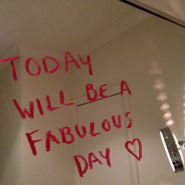 a bathroom mirror with writing on it that says today will be a fabulous day in red