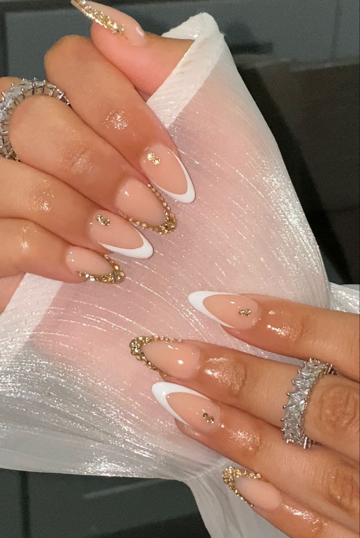 French nails Almond Nails Diamonds Rhinestones, Almond Nail Ideas With Rhinestones, White French Tip With Gold Diamonds, Round French Tip Nails With Rhinestones, Bling Nails Almond Shape, Acrylic Nails With Jewels Rhinestones, Almond Nail Design With Rhinestones, Almond Nails With Rhinestones Classy, Almond Nail Designs With Rhinestones