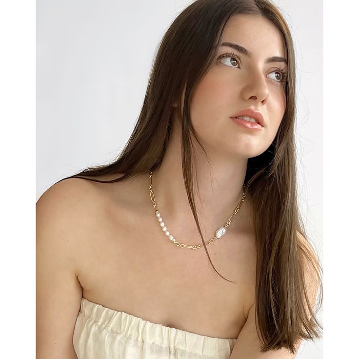 Discover modern elegance with our Emily Pearl Link Chain Necklace. This statement piece combines two different styles of stunning freshwater pearls for a unique design that will elevate any outfit from day to night. With its must-have status, you won't want to take it off. Wipe pearls and chain with a soft cloth after wear. Avoid impact against hard surfaces or contact with abrasive surfaces. When wearing your beautiful piece please we recommend removing your jewellery when you shower and when s Chic White Chain Necklace With Pearl Charm, Modern Pearl Necklace With Pearl Pendant, Modern Pearl Jewelry With Adjustable Chain, Chic White Pearl Necklace For Everyday, Modern White Necklace With Pearl Charm, Modern White Necklaces With Pearl Charm, Chic Everyday White Pearl Necklace, Everyday Elegance Pearl Chain Jewelry, Chic White Pearl Pendant Jewelry