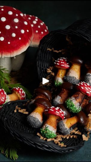 some mushrooms are sitting in a basket on the table