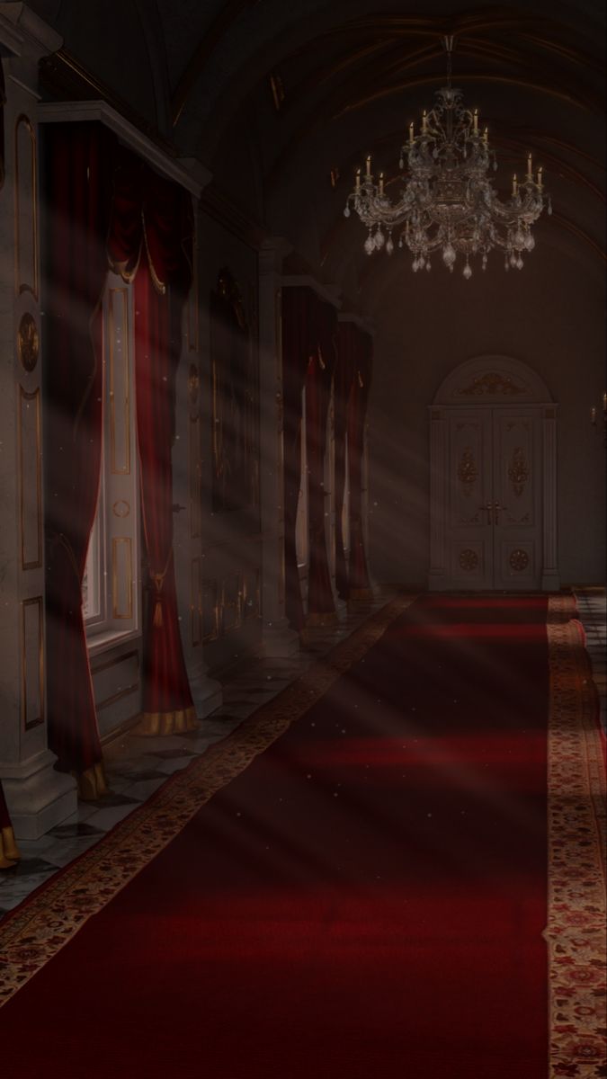 a red carpeted hallway with chandelier and curtains