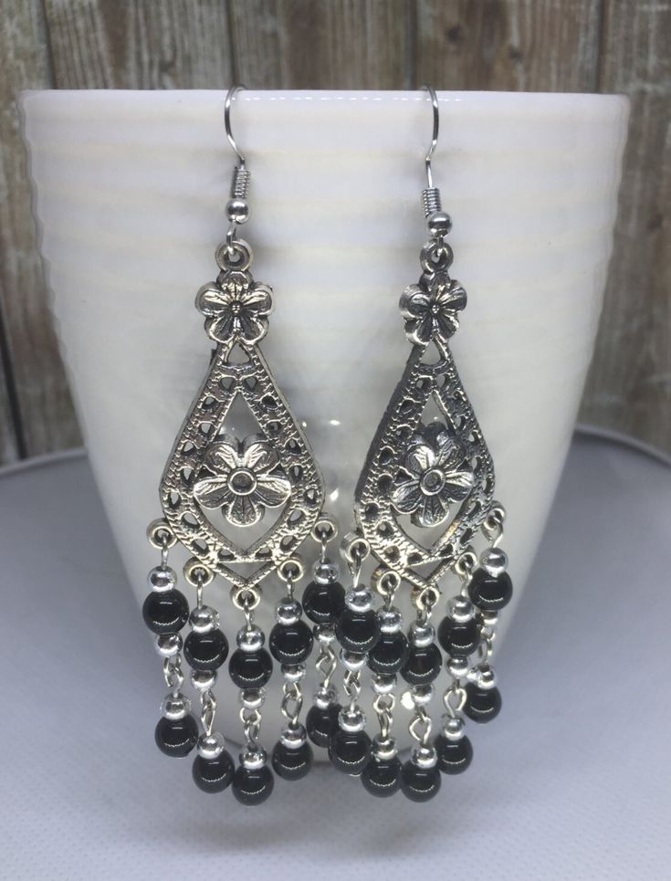 Antique Silver Drop Earrings. Fun, trendy earrings. Black Bohemian Dangle Plug Earrings, Metal Tassel Drop Earrings For Pierced Ears, Trendy Metal Beaded Earrings, Trendy Metal Earrings With Beaded Details, Trendy Nickel-free Silver Beaded Earrings, Trendy Silver Nickel-free Beaded Earrings, Metal Tassel Earrings With Dangling Beads, Trendy Adjustable Silver Beaded Earrings, Black Metal Bohemian Chandelier Earrings