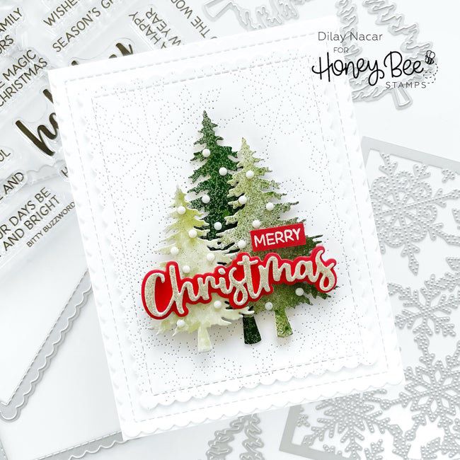 a christmas card with the words merry christmas on it and a small tree in the middle