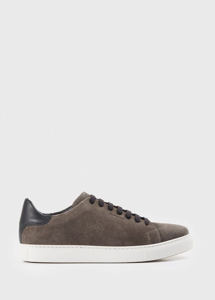 Crafted in Italy, this classic wear-with-everything suede and leather low-top sneaker is a wardrobe essential. Easy everyday style to wear from work to weekend or pair with suiting for a cool, modern look.. Paul Stuart is one of the oldest and most well respected names in fashion, offering exclusive and custom tailored clothing, sportswear, footwear and accessories for men and women. Renowned for expert craftsmanship, thoughtful design using materials and fabrics sourced from the finest mills ar Suede Sneakers, Custom Tailoring, Accessories For Men, Everyday Style, Golden Goose Sneaker, In Fashion, Converse Sneaker, Suede Leather, Wardrobe Essentials