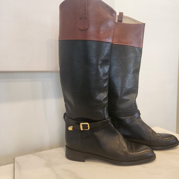 These Women's Andre Assous Knee High Boots Are So Gorgeous!! Size 9, All Leather Made In Italy, Color Block Heel, 2 Tone Gorgeous Brown And Black With Strap And Beautiful Hardware... Boys On The Outside Are In Almost Perfect Shape, The Inside Has Some Wear, And On One More Than The Other, But No One Would See That When They Are On... See Pics... Outside Look Like They Have Been Worn Once!! Message Me With Any Questions You May Have. # Knee High Boots# All Leather# Riderboots# I Am Able To Ship Out Fast And Open To Offers Be Sure To Check Out My Fun And Stylish Closet To Bundle And Save Andre Assous Boots, Pics Outside, Stylish Closet, Color Block Heels, Leather Knee High Boots, Knee High Leather Boots, Almost Perfect, Over The Knee Boots, Over The Knee