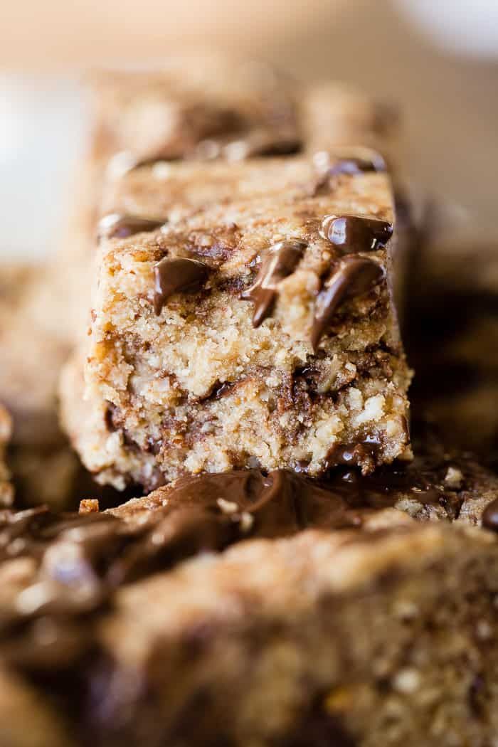 chocolate chip cookie bars stacked on top of each other