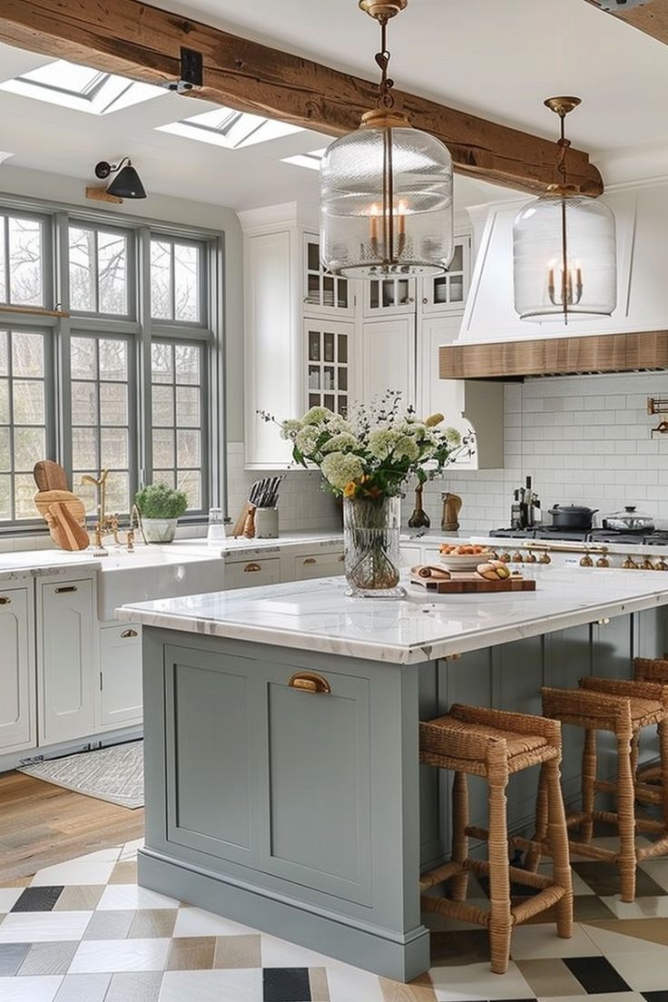 a large kitchen with an island in the middle and lots of stools around it