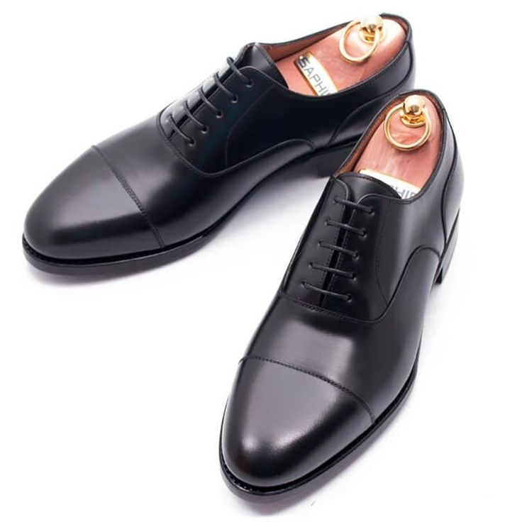 Handsome, polished and easy to wear, this wardrobe-staple leather oxford sports minimal detailing to give it maximum versatility across your formal wardrobe. DETAILS & CARE True to size Lace-up style Calfskin leather upper and lining/rubber sole Timeless Black Derby Shoes For Semi-formal Occasions, Fitted Business Oxford With Leather Sole, Fitted Business Oxford Shoes With Leather Sole, Sleek Black Oxfords For Business Casual, Fitted Oxford Shoes With Brogue Detailing For Business, Fitted Leather-sole Oxford Shoes For Business, Fitted Oxford Shoes With Leather Sole For Business, Leather Oxford Shoes For Business With Plain Toe, Classic Black Derby Shoes For Business Casual