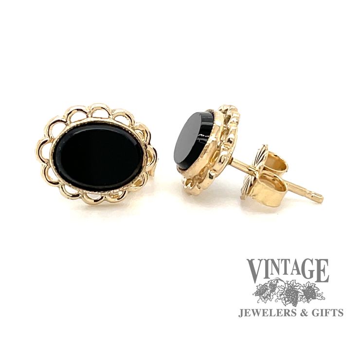 The striking color of these oval onyx stones against the golden backdrop of these earring mountings will help complete the classic wardrobe styling of a black outfit. These earrings have a filigree halo border for these bezel set onyx stones. The earrings are secured with friction post and nut in 14 karat yellow gold. Black Oval Earrings For Anniversary, Elegant Oval Cabochon Earrings For Formal Occasions, Timeless Oval Black Enamel Jewelry, Elegant Formal Oval Cabochon Earrings, Elegant Oval Cabochon Earrings For Anniversary, Elegant Black Oval Earrings, Classic Filigree Earrings, Classic Black Enamel Earrings For Anniversary, Black Oval Filigree Jewelry