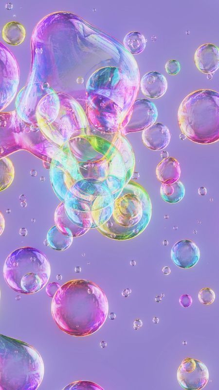 soap bubbles floating in the air on a purple background