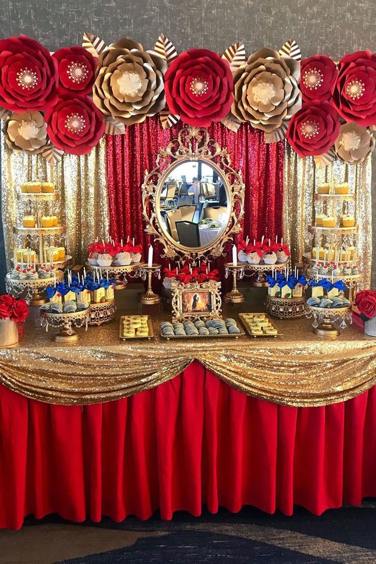 a table topped with lots of food and decorations