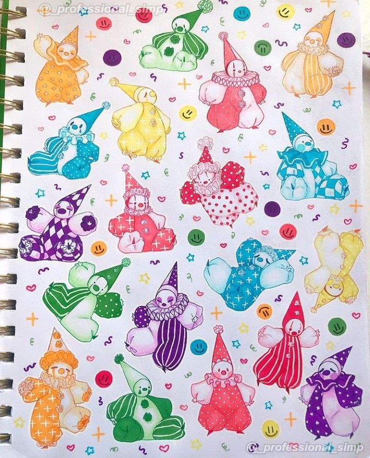 an open notebook with many different colored bears and clowns on it's cover