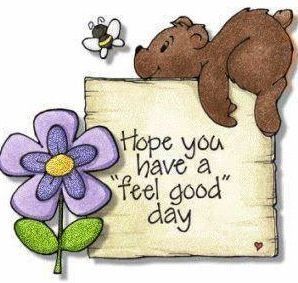 there is a bear holding a sign with a flower in front of it that says hope you have a feel good day