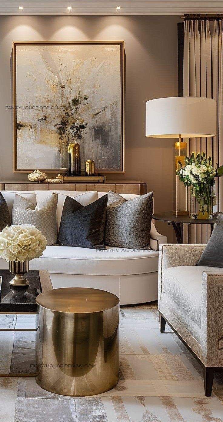 a living room filled with lots of furniture next to a painting on the wall above a coffee table