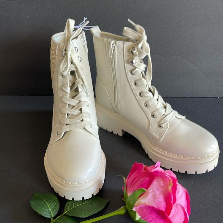 New Boots Never Worn. Colors Is Off White Or Cream. Zipper At Side And Easy To Put On And Elastic Material On The Other Side For Comfortability. Cream Lace-up Boots With Round Toe For Spring, Trendy White Combat Boots With Round Toe, White Lace-up Combat Boots For Spring, Spring White Lace-up Combat Boots, Casual Cream Closed Toe Boots, Casual Cream Lace-up Boots, Spring High Ankle Synthetic Combat Boots, White Combat Boots With Lug Sole And Round Toe, High-top Synthetic Combat Boots For Spring