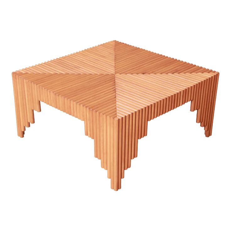 a coffee table made out of strips of wood