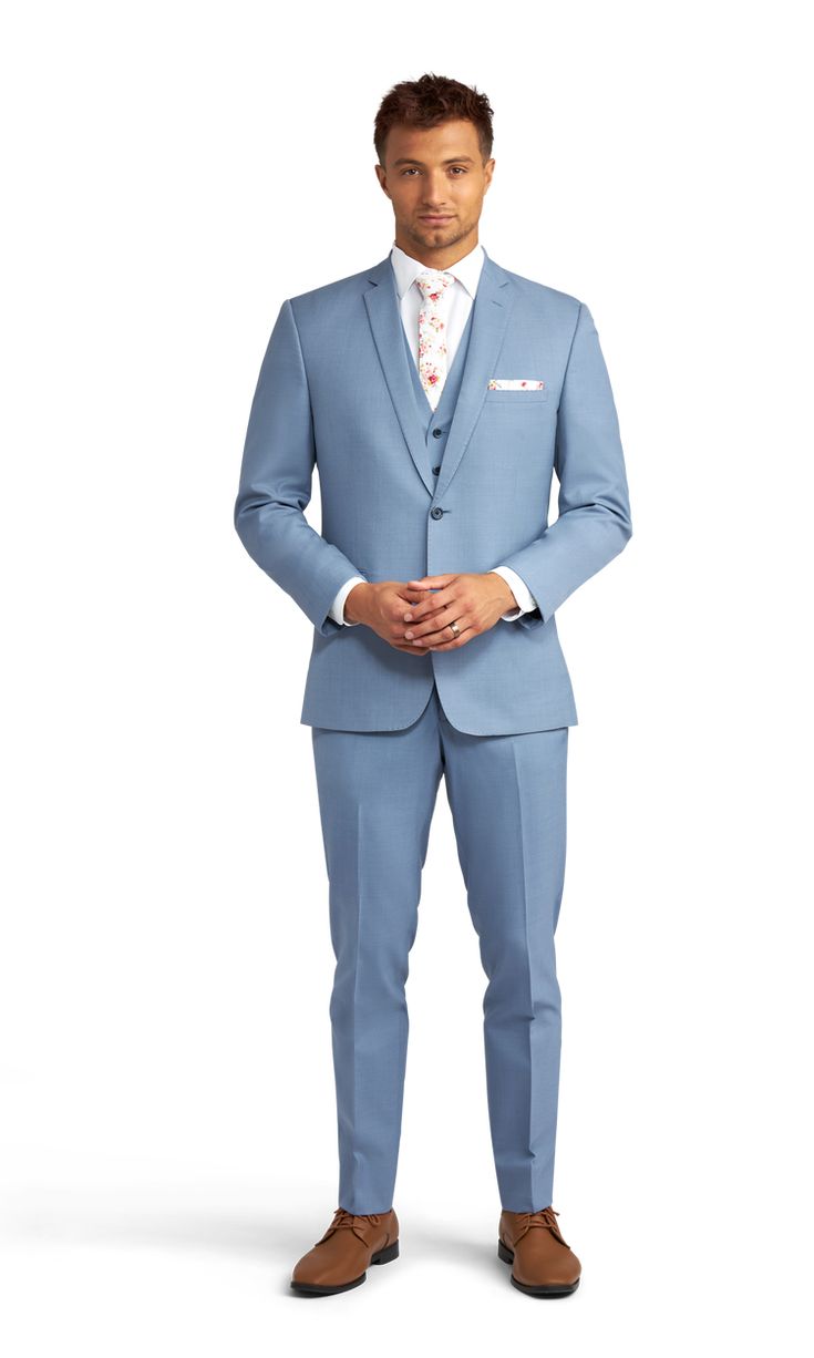 A slim light blue suit with two buttons and a notch lapel. Blue Wedding Suit Groom, Formals For Men, Blue Groomsmen Suits, Notch Lapel Suit, Blue Groomsmen, Groomsmen Tuxedos, Light Blue Suit, Blue Suit Men, Blue Suit Wedding