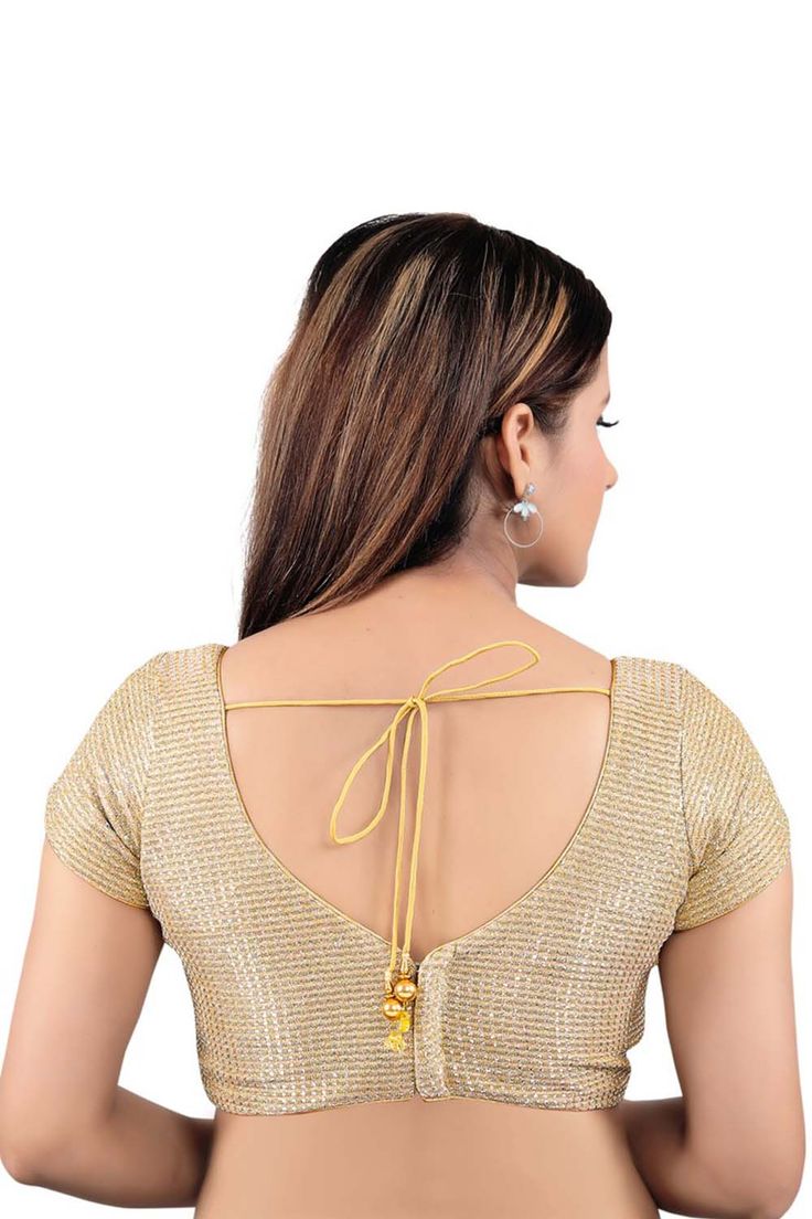 Product Features: Color: Gold Fabric: Brocade Work: Sequin and Embroidered Sleeves: Short Sleeves Neckline: Round Neck Closure: Back Open Care Instructions: First wash dry clean only Occasion: Festive Disclaimer: Tassel can very according to stock availability and Also there will be slight difference in digital to actual image Sequin Saree Blouse, Sequin Saree, Silk Clutch, Brocade Blouses, Sequin Blouse, Gold Blouse, Embroidered Sleeves, Trendy Sarees, Blouse For Women