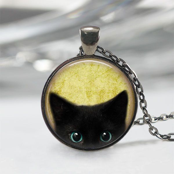 Handmade art pendant necklace featuring a peeking black kitten. You can choose your finish between antique bronze, antique silver, gunmetal or antique copper. This beautiful pendant is handcrafted by me... using a high quality art print image and is protected by a beautiful crystal clear domed glass cabochon which enhances the image for a truly stunning effect! The glass cabochon measures approximately 1 inch in diameter. The pendant and chain are nickel-free plated alloy and are available in an Cat Vintage Aesthetic, Black Cat Vintage, Black Cat Jewelry, Black Cat Necklace, Aesthetic Jewellery, Cat Apparel, Halloween Pendant, Cat Vintage, Black Kitty