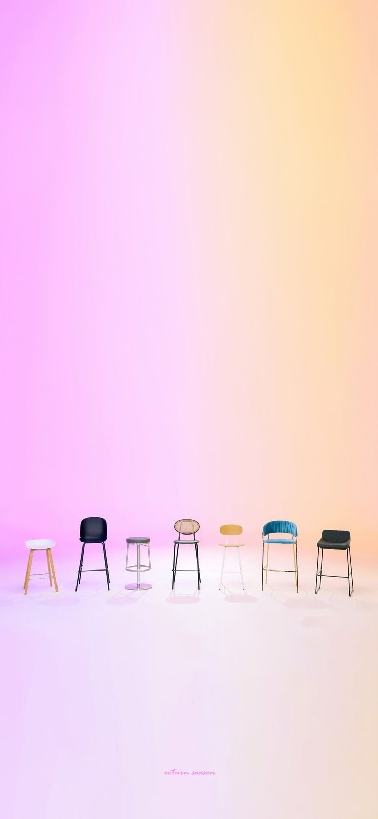 four different colored chairs sitting in front of a pink and yellow background with the same color