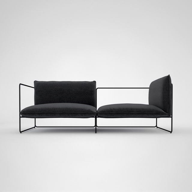 two black couches sitting next to each other on a white surface with no one in it