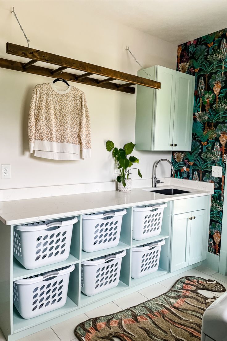 the laundry room is clean and ready to be used as a storage area for clothes