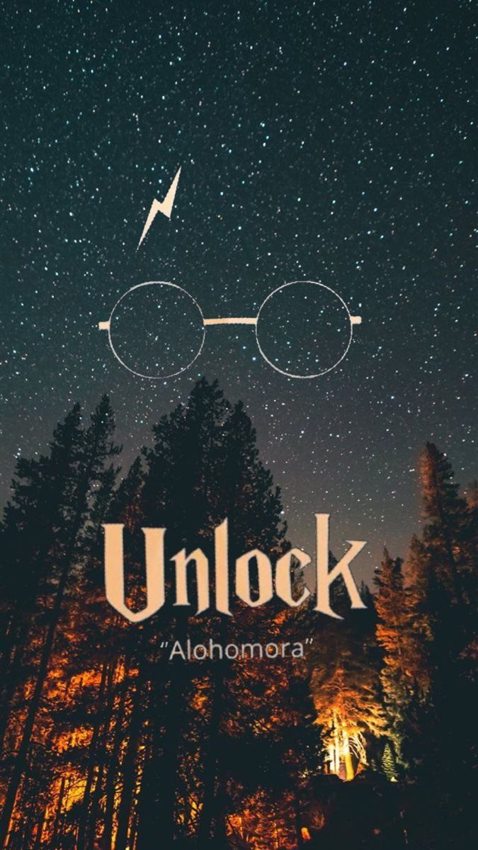 harry potter's glasses with the words unlock above them in front of some trees