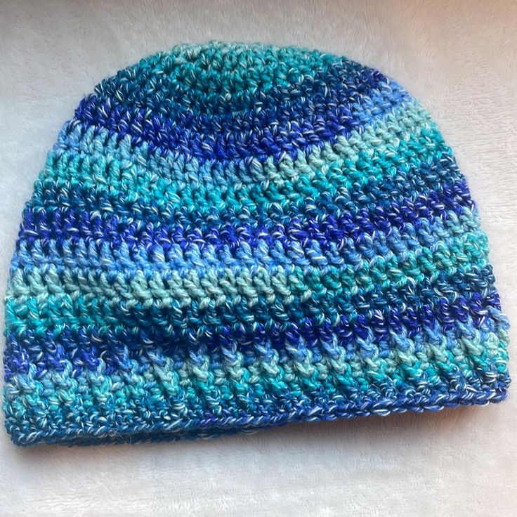 Handmade With Lion Brand Ice Cream Yarn Beautiful Blue And Green Colors Warm Blue Beanie Hat, Warm Blue Beanie Cap, Blue Knitted Hat For Spring, Blue Hand Knitted Hats For Spring, Blue Fitted Casual Beanie, Blue Warm Beanie One Size, Warm Blue Beanie One Size, Adjustable Blue Crochet Hat For Beach, Blue Warm Hat One Size