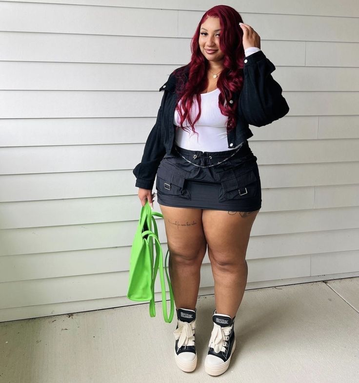 Plus Size Graffic Tee Outfit, Baddie Aesthetic Plus Size, Consert Outfits Ideas Plus Size, Plus Size Houston Outfits, Cargo Skirt Outfit Black Women Plus Size, Plus Size Winter Outfits Black Women Baddie, Plus Clubbing Outfits, Apple Shape Outfits Black Women, Rod Wave Concert Outfit Plus Size