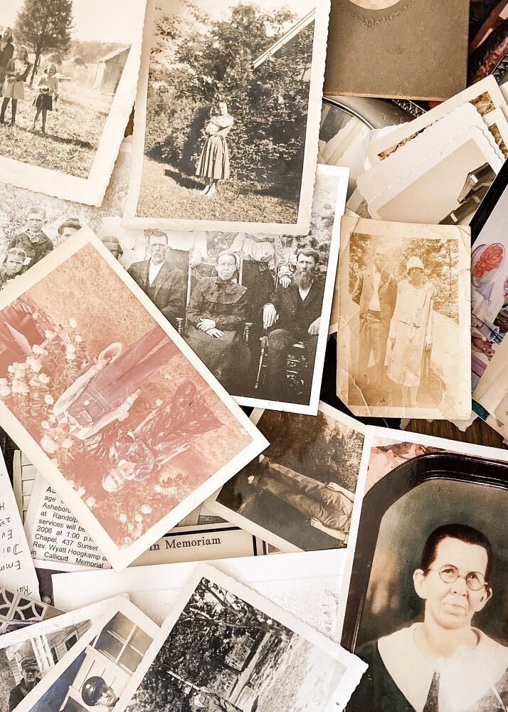 many old photographs are spread out on top of each other