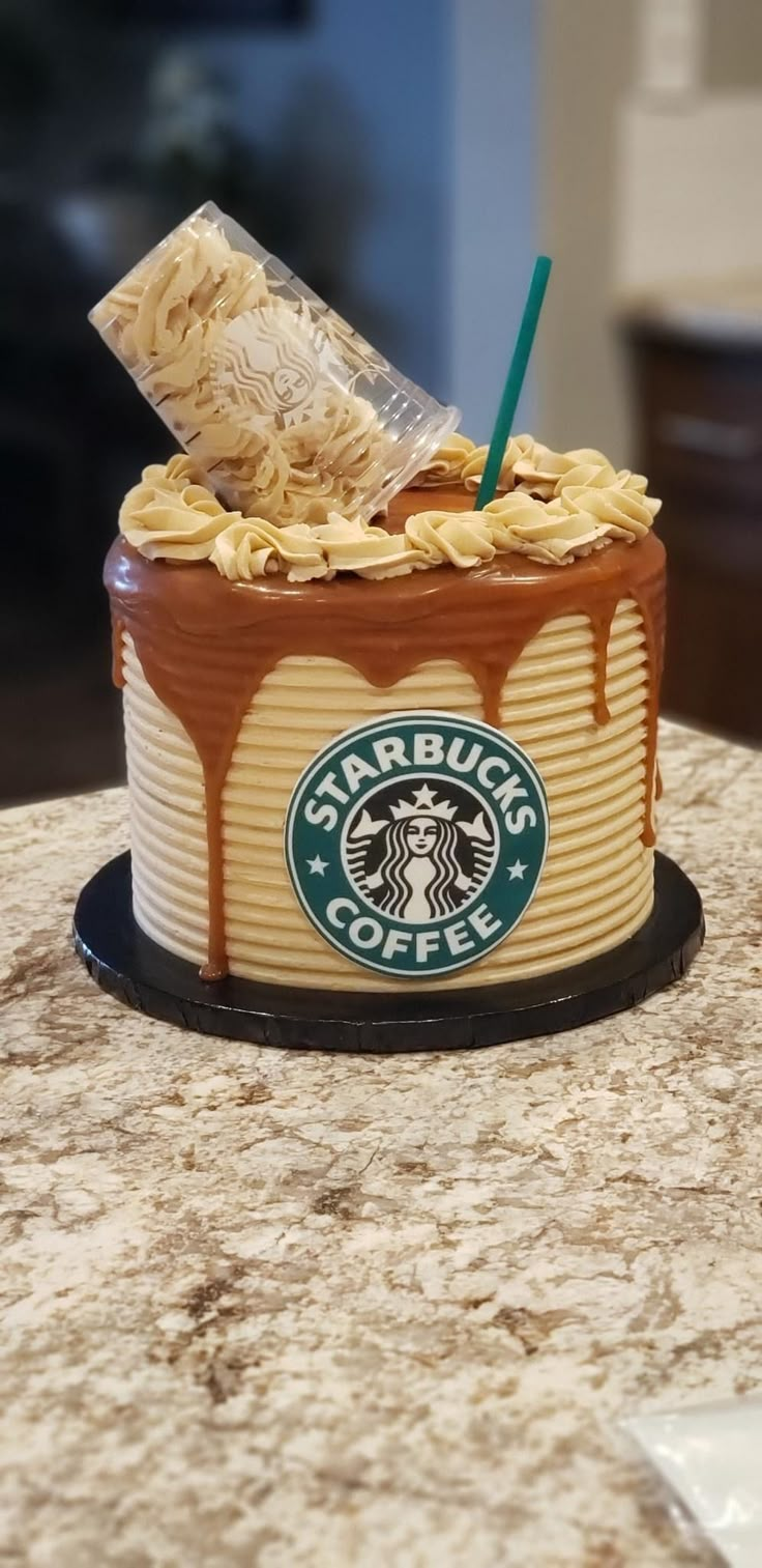 a starbucks cake sitting on top of a counter