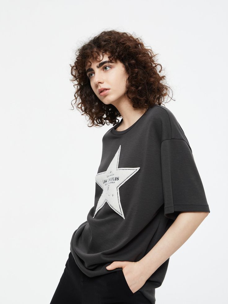 Details: Star patch embroidery black T-shirt Created with HOOHOOLYWOOD star-inspired design Comfortably loose at the hem Materials & Care: Cotton 86.3%Nylon 13.7% Hand wash | Dry clean Do not bleach Size & Fit: Model is 5'7", Bust 32, Waist 24, Hips 35, wearing a size S Item #: IL3TE14 Patch Embroidery, Black T Shirt, Black Tshirt, Sweat Shirt, Design Inspiration, Hand Wash, T Shirt, How To Wear, Black