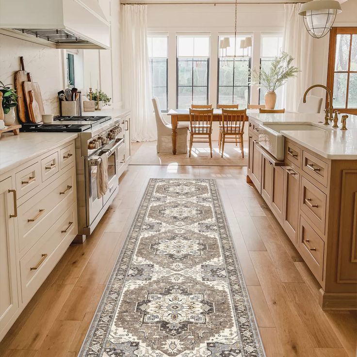 a large rug in the middle of a kitchen