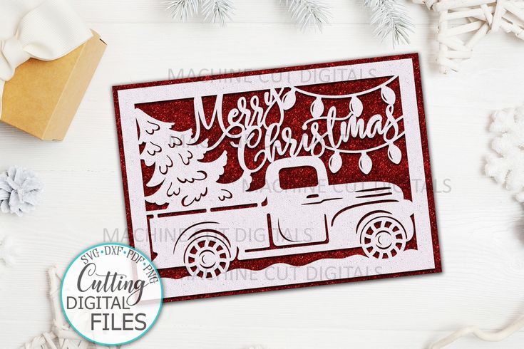 a christmas card with the words merry christmas on it and a truck next to snowflakes