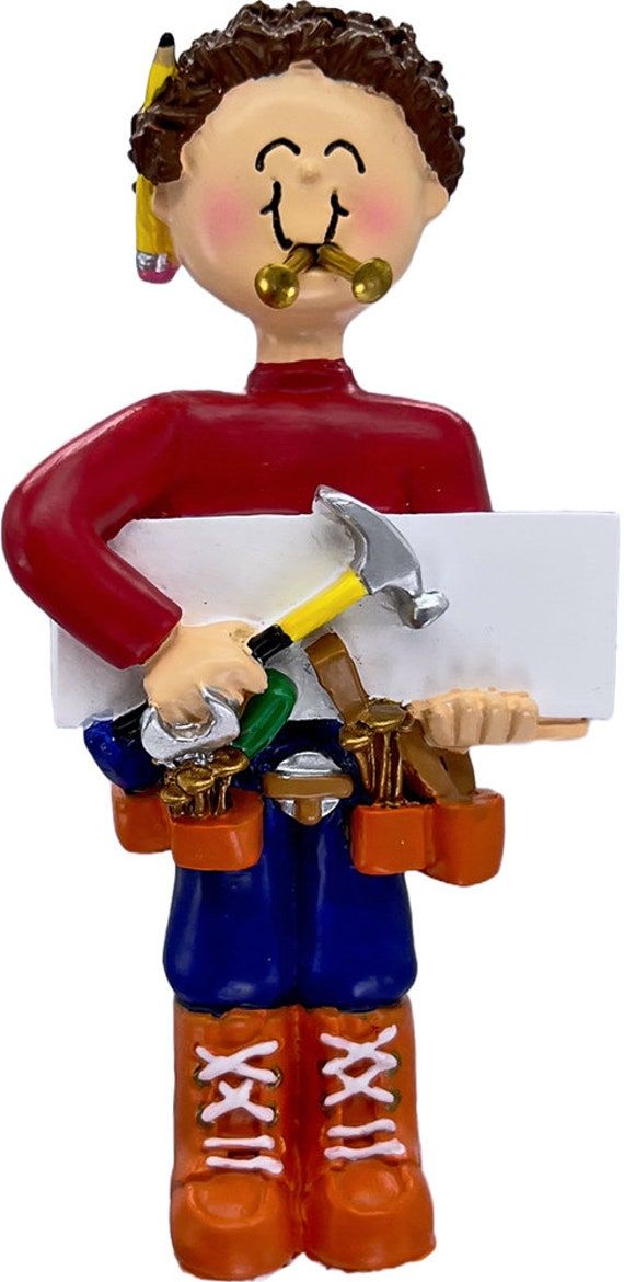 a ceramic figurine of a man holding tools