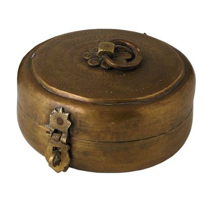 an old brass box with a lock on the lid